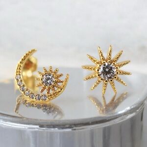 CZ star and moon asymmetrical gold plated stud earrings. New.